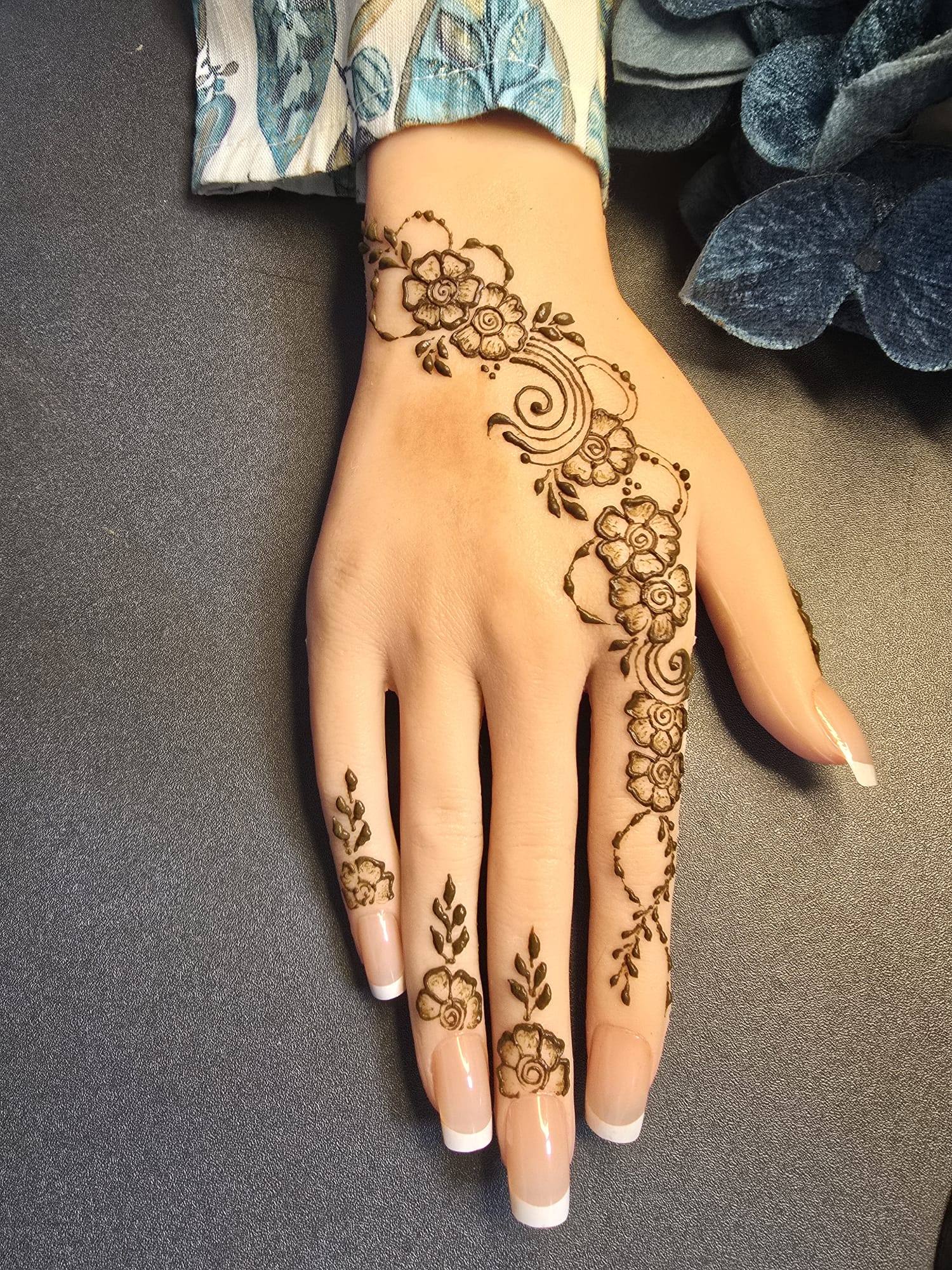 Floral side trail mehndi design for Shravan month