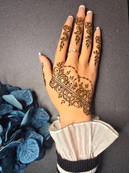 Detailed floral henna section with delicate line work