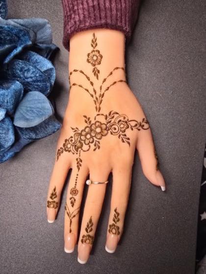 Floral mehndi style study with fine details