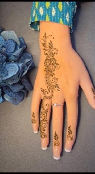 Arabic-style henna section with slim hand flow